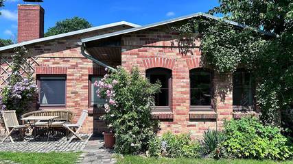Ferienwohnung für 4 Personen, mit Garten und Terrasse sowie Ausblick in Carinerland