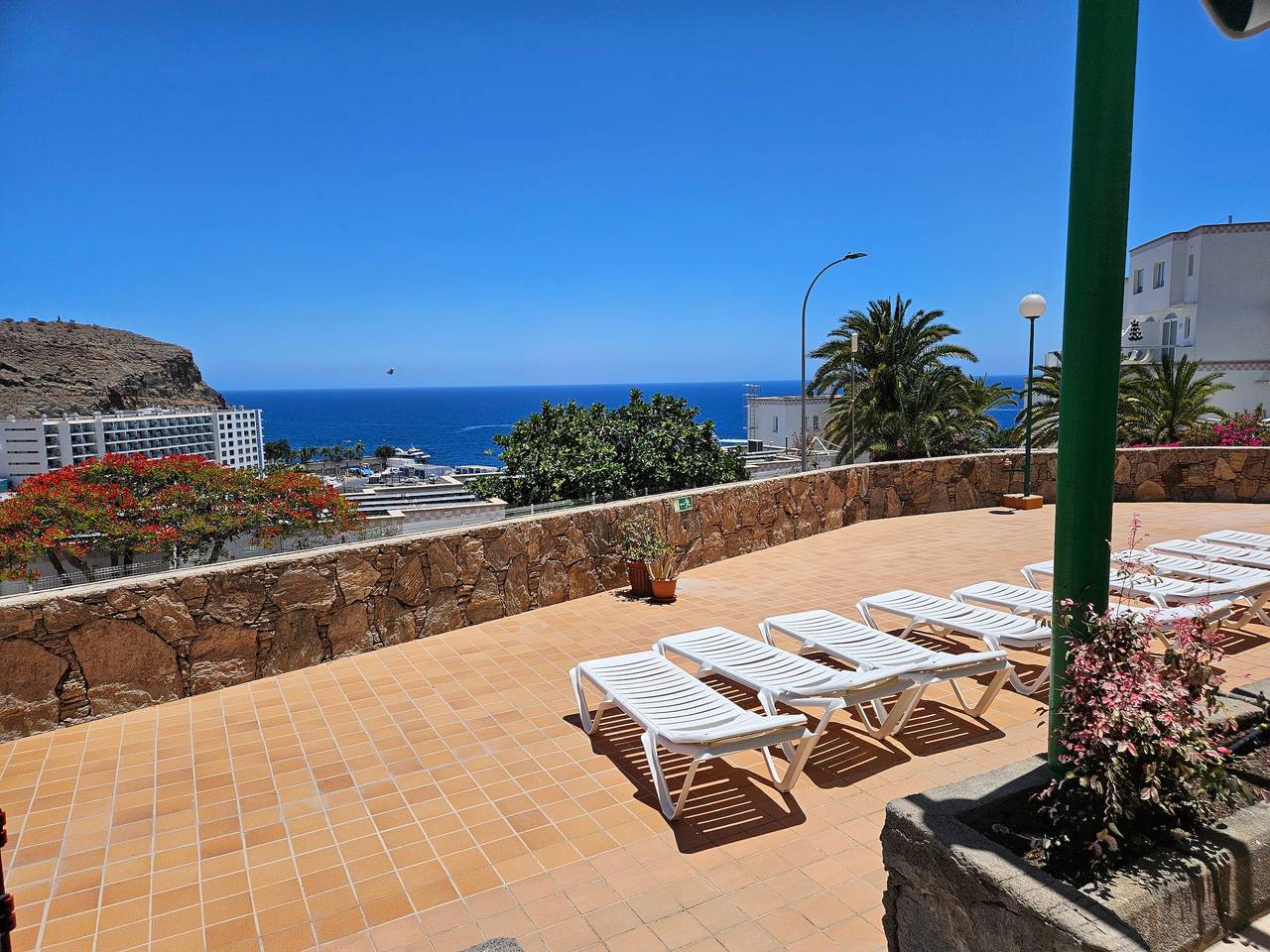 Geheel appartement, Vakantieappartement 'Casa Los Veleros F1' met zeezicht, wifi en airconditioning in Puerto Rico (Gran Canaria), Mogán