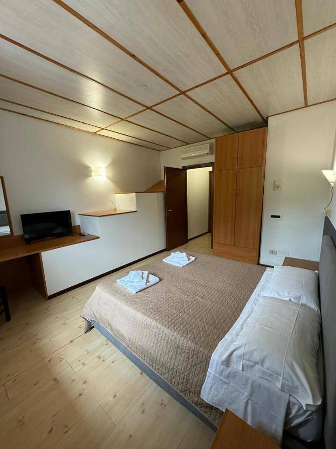 Maison d’hôte pour 2 personnes, avec Terrasse ainsi que Jardin et Piscine à Mortegliano