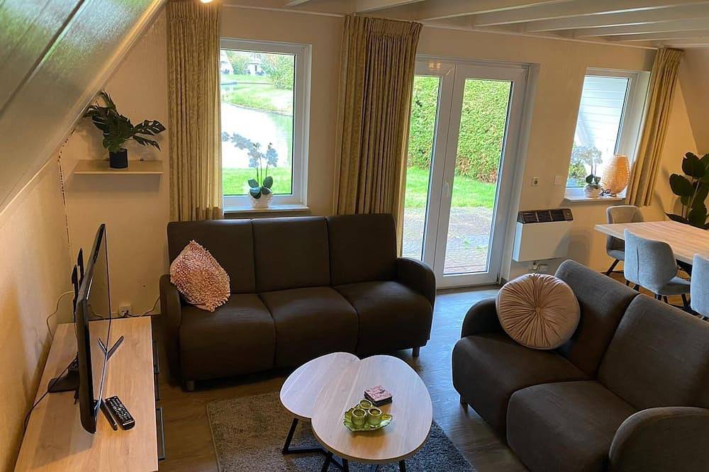 Relaxen in mooi vakantiehuis aan visvijver! Huisdieren welkom in Gramsbergen, Hardenberg