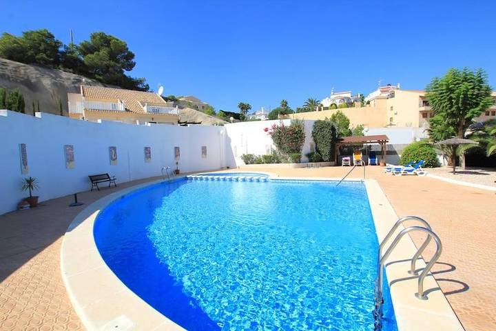 Location de vacances pour 4 personnes, avec piscine ainsi que jardin et vue dans Ciudad Quesada