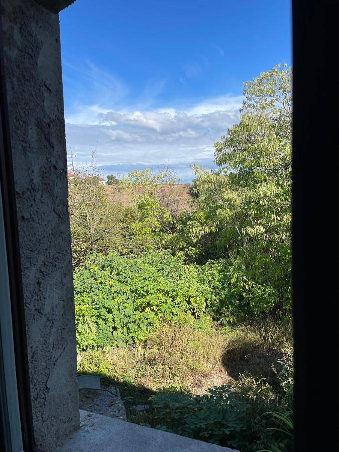 Appartement de vacances pour 2 personnes, avec terrasse ainsi que jardin et vue
