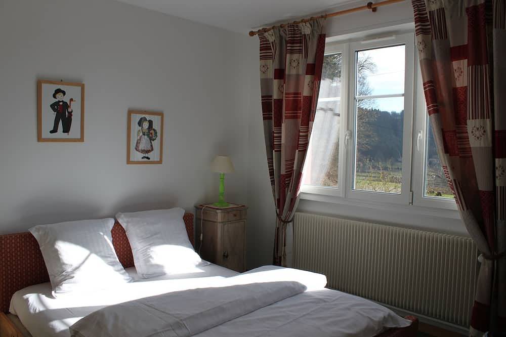 Häuschen am Fuße der Burgen in Windstein, Nordelsass