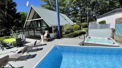 Ferienhaus für 8 Personen, mit Pool und Garten sowie Sauna in Rheinböllen