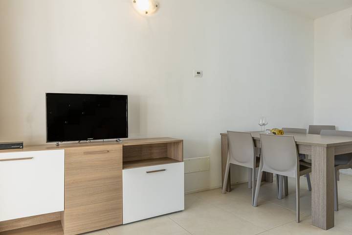 Appartamento intero, Appartamento "Residenza Cormorani 2" vicino alla spiaggia con vista mare, Wi-Fi e terrazza in Terza Spiaggia, Golfo Aranci