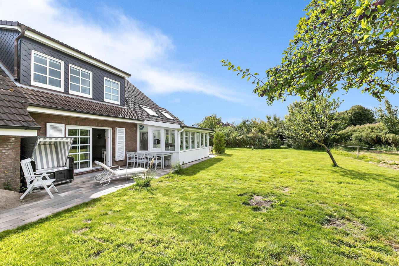 Ganze Wohnung, Ferienwohnung Ebbe" mit privater Terrasse, Gemeinschaftsgarten und Wi-Fi in Rodenäs, Nordfriesland