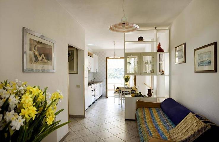 Appartamento per 9 persone, con giardino e panorama, adatto a famiglie con bambini in Pomonte