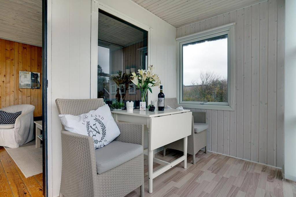 Reetgedecktes Ferienhaus mit Garage und kleinem Wintergarten. in Henne, Varde