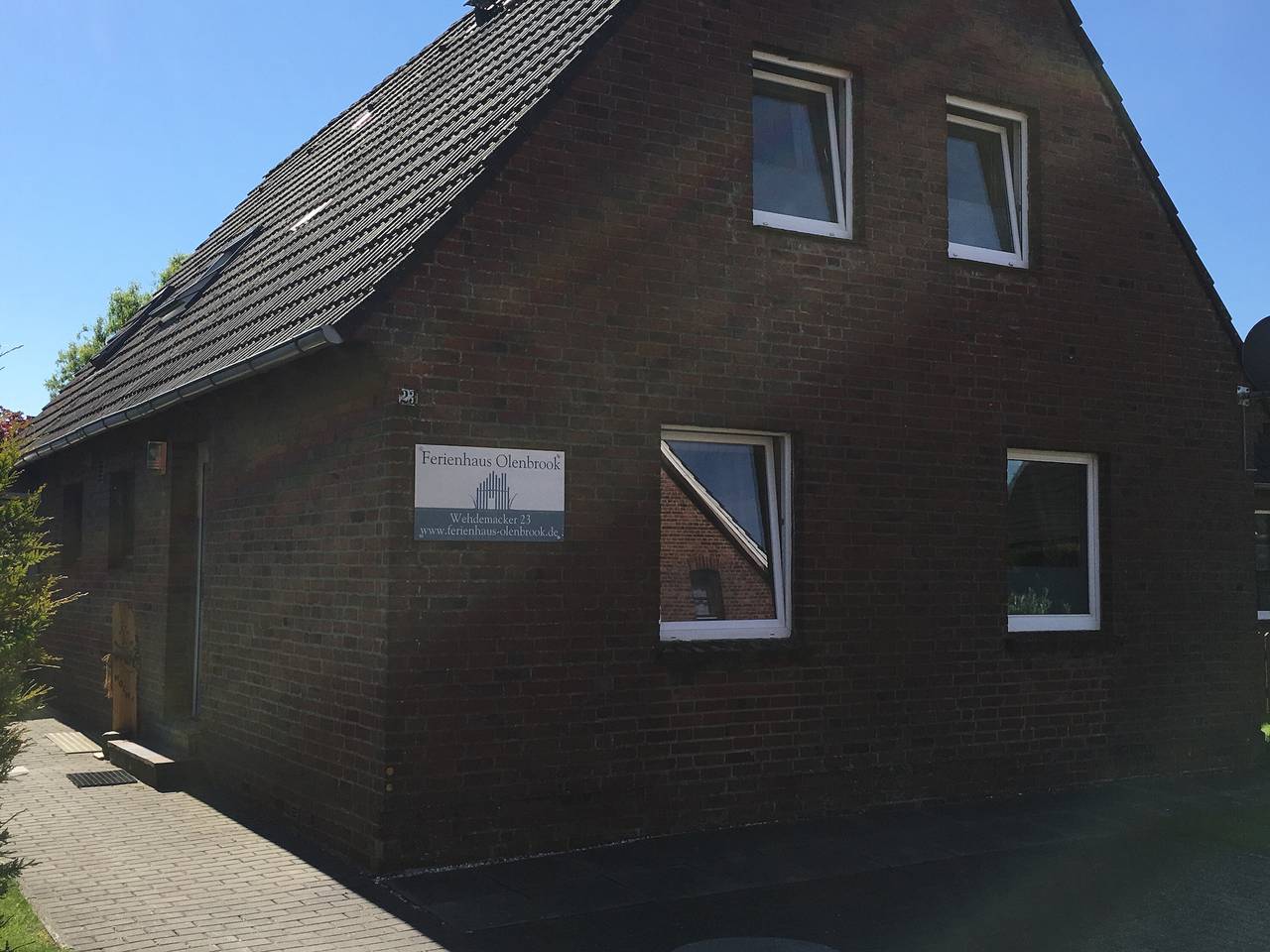 Ferienhaus 'Olenbrook' mit gemeinsamer Terrasse, Gemeinschaftsgarten und Wlan in Altenbruch, Cuxhaven