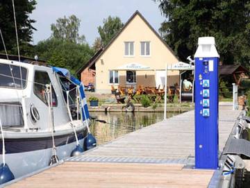 Ferienwohnung für 4 Personen, mit Garten und Seeblick, kinderfreundlich in Vipperow