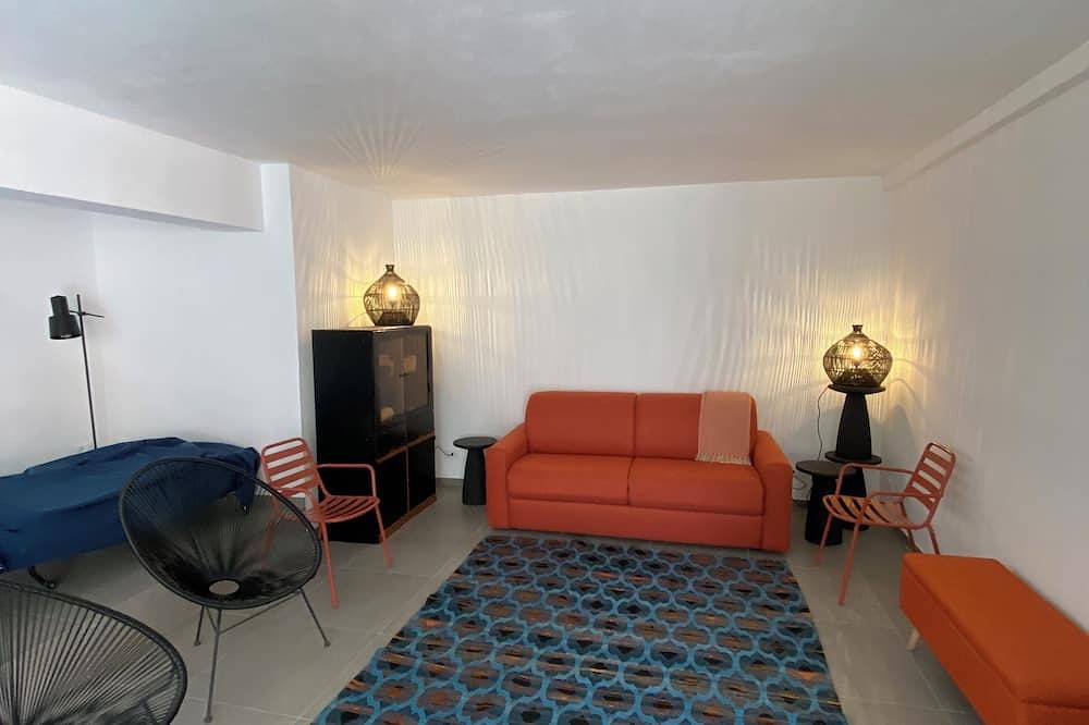 In the hills of the Italian Riviera, a fully renovated 47-square-meter loft in Noli, Riviera di Ponente