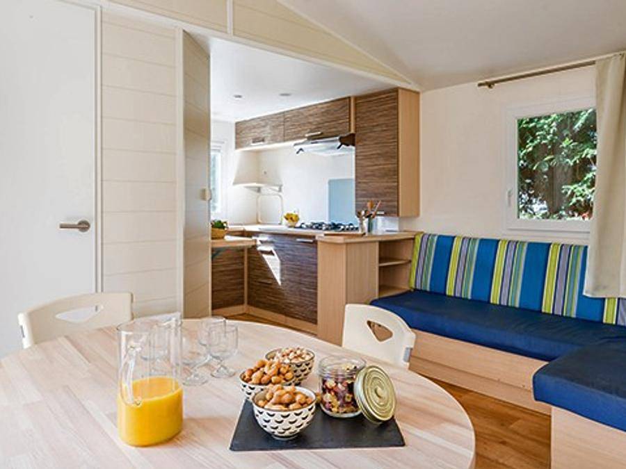 Camping Marvilla Parks - La Pinède - Mobile home 4 persons - Comfort Xl | 2 Bedrooms | 4 Pers. | Raised terrace | Tv in Les Mathes, Côte de Beauté