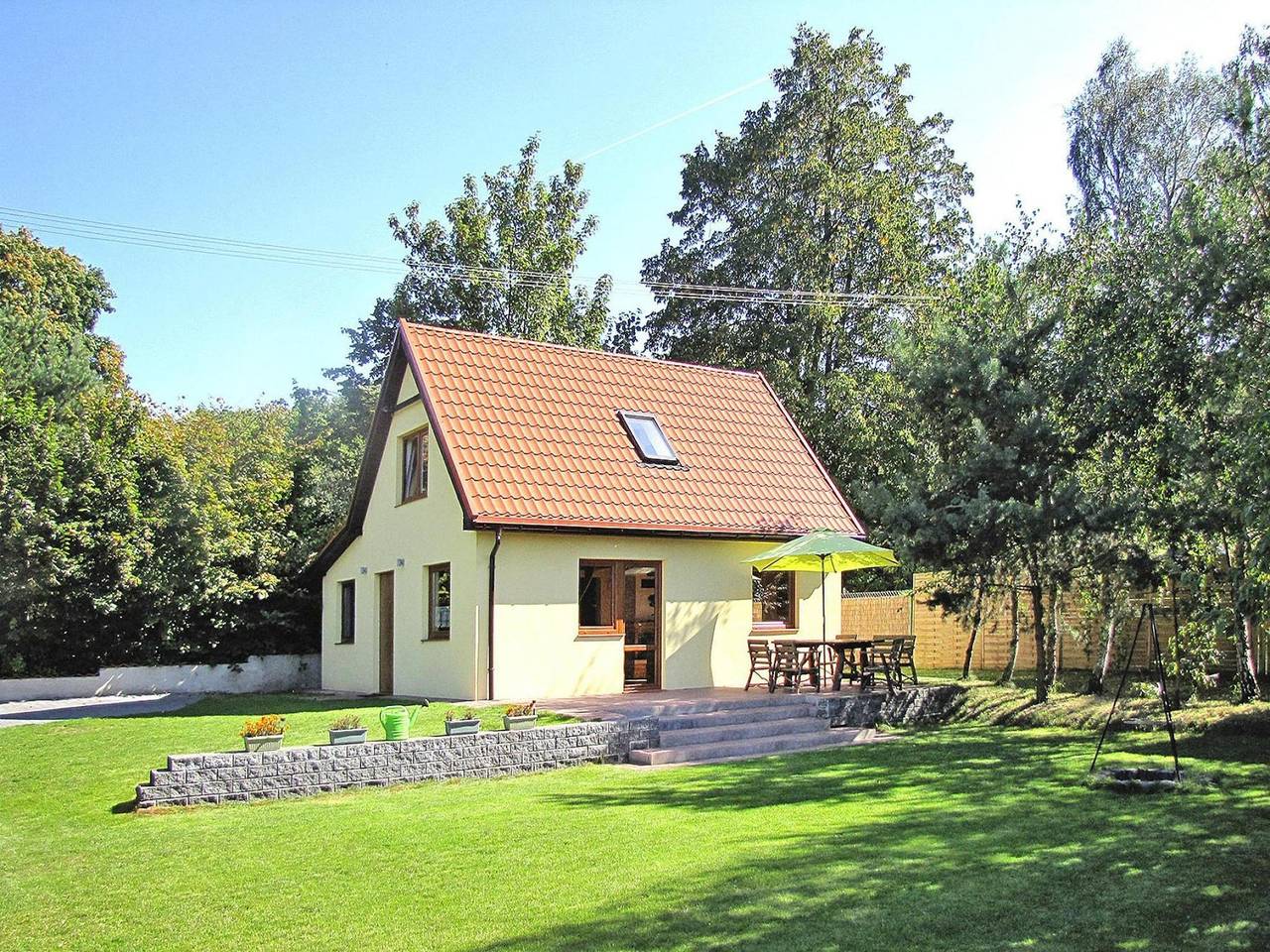 Ferienhaus am Wilkasy-See mit Ruderboot in Löwentinsee