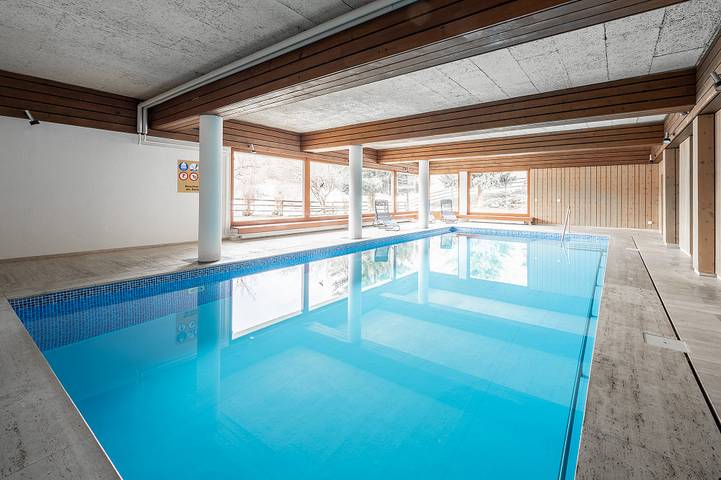 Ferienwohnung für 4 Personen, mit Balkon und Terrasse sowie Garten und Sauna in Laax
