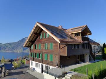 Ferienwohnung für 3 Personen, mit Seeblick und Terrasse sowie Ausblick am Thunersee