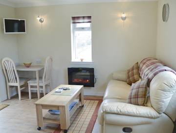 Gîte pour 2 personnes, avec jardin dans Highlands