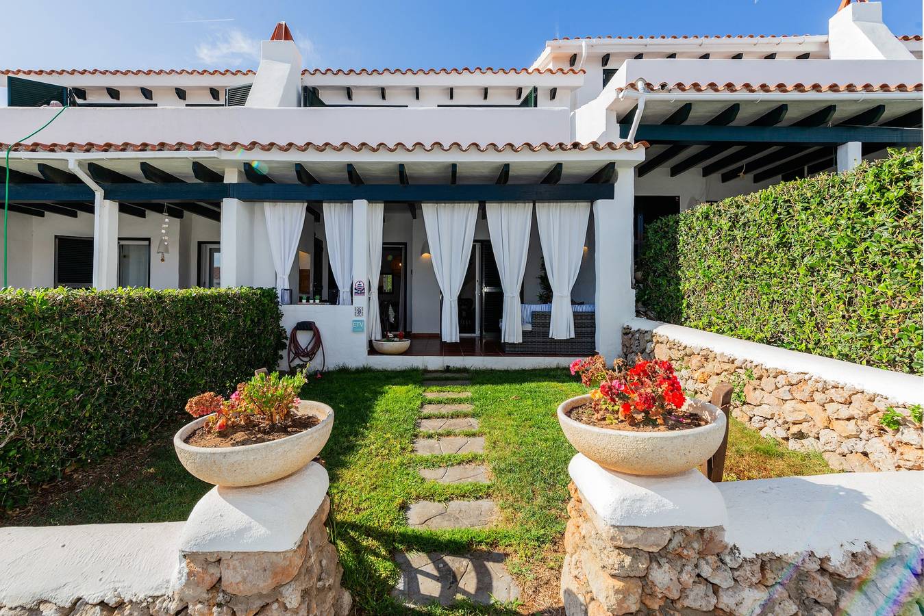 Casa "Maison Menorca" con vistas al mar, piscina compartida y Wi-Fi in Arenal d'en Castell, Es Mercadal