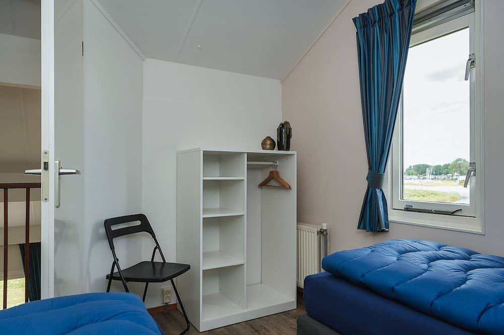 Vrijstaande bungalow met uitzicht over het Veluwemeer of gelegen aan een binnentuin. in Elburg, Veluwemeer