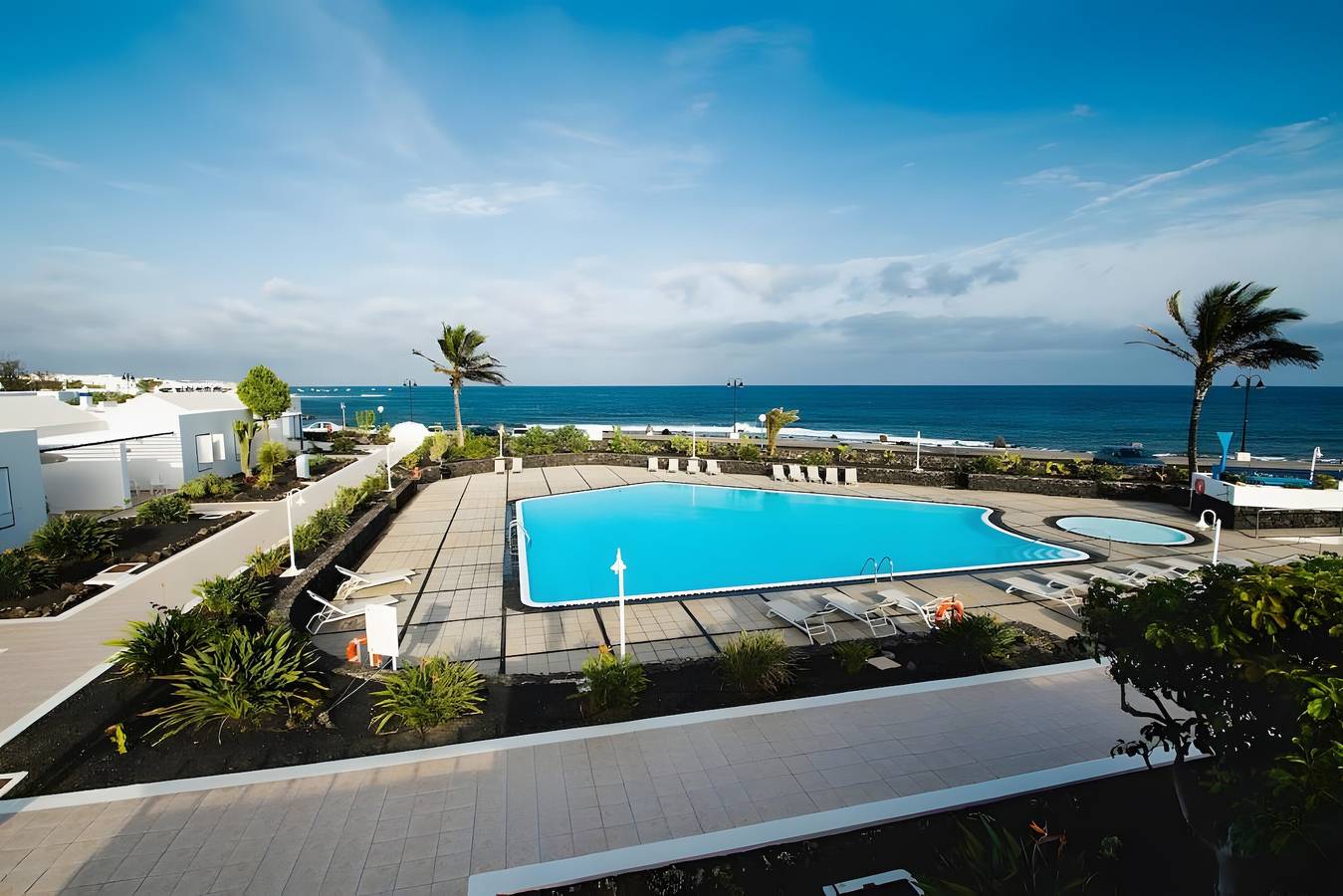 Ferienhaus 'Caleta Campos Bungalows' mit Meerblick, Gemeinschaftspool und Wlan in Punta de las Mujeres, Haría