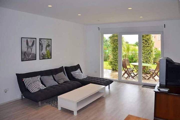 Appartement de vacances pour 4 personnes, avec jardin