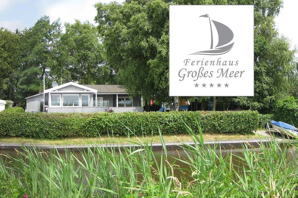 5 Sterne Ferienhaus mit freiem Seeblick, direkter Wasserlage und eigenem Steg. — Bild 5