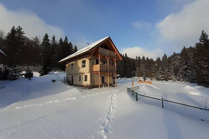 Ferienhaus für 7 Personen, mit Balkon und Garten sowie Sauna