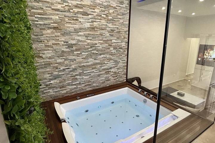 Maison de vacances pour 4 personnes, avec sauna et jardin ainsi que terrasse et jacuzzi