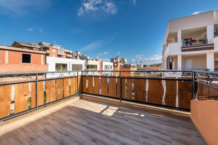 Appartamento intero, Spaziosa casa vacanze "Paradise Home" con Wi-Fi e balcone in Quartu Sant'Elena, Campidano