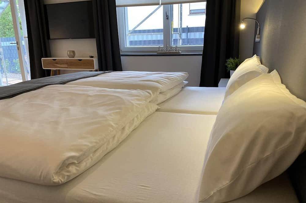 Apartamento entero, Studio with terrace incl. use of wellness garden - Bauernhaus Loth - exclusive in Losheim am See, Saar-Nahe-Bergland