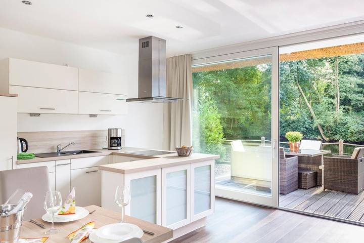 Ferienwohnung für 3 Personen, mit Balkon/Terrasse und Terrasse sowie Garten und Sauna