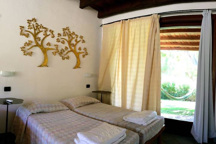Villa Bibi with swimming pool, three doubles, garden, private beach. in Porto Sa Ruxi, Villasimius