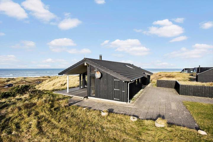 Ferienhaus mit Meerblick für 8 Personen, mit Sauna und Terrasse sowie Whirlpool in Grønhøj Strand