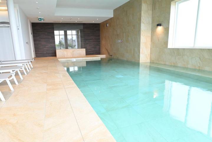 Appartement de vacances pour 4 personnes, avec piscine ainsi que balcon et sauna