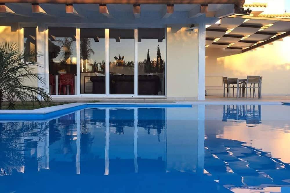 Appartement entier, Appartement de 90 m² dans villa avec piscine individuelle et jardin in Arenella, Syracuse