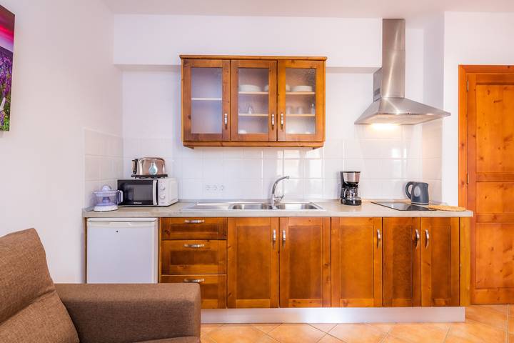 Apartamento inteiro, Apartamento 'S Hort Can Capità Familiar Terraza 4' perto do Mar com Piscina Partilhada & Wi-Fi in Ariany, Maiorca Centro