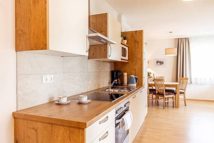 Ferienwohnung für 2 Personen, mit Balkon und Sauna sowie Pool und Garten