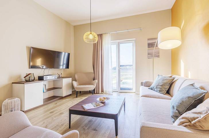 Ferienwohnung für 6 Personen, mit Balkon und Sauna sowie Seeblick in Wustrow