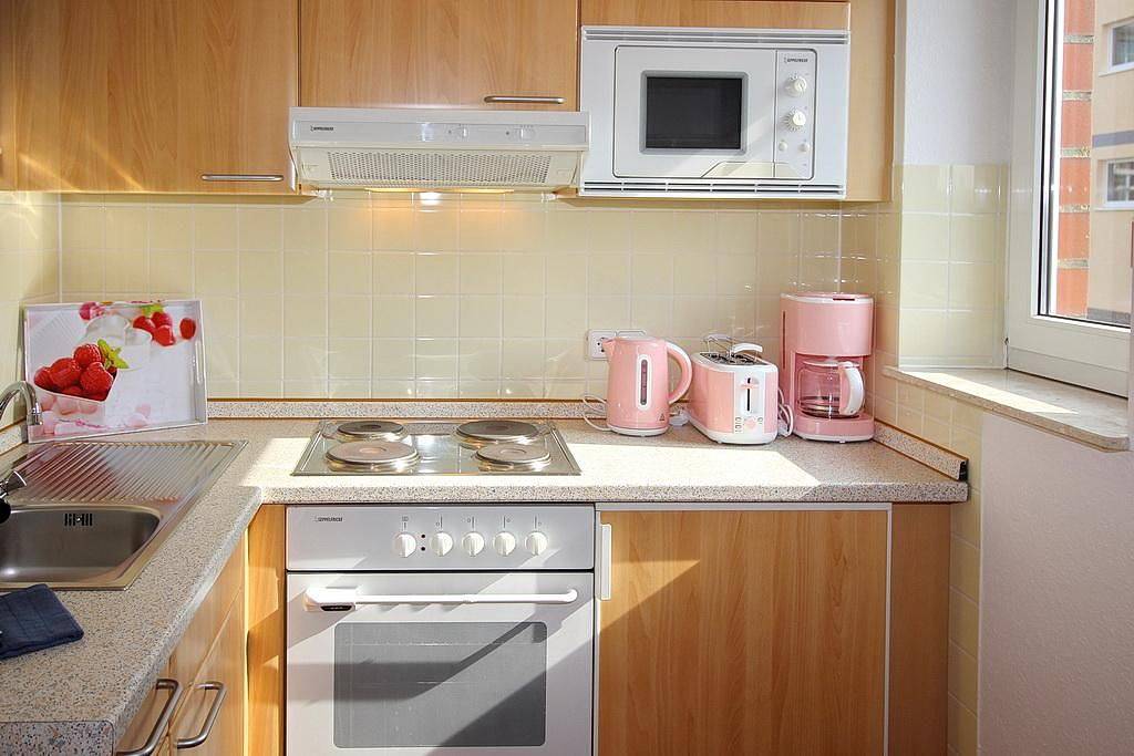 Ganze Wohnung, Hübsche Ferienwohnung am Meer mit Balkon und Blick zum grünen Nordseedeich in Schillig Strand, Wangerland