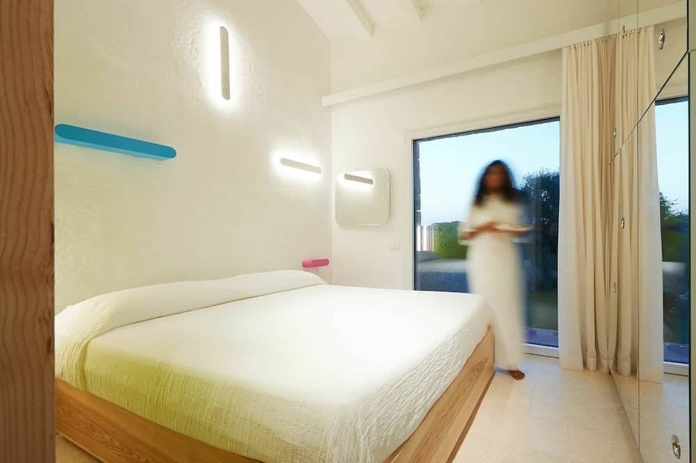 Accogliente appartamento in villa per 6 ospiti con piscina, A/C, Tv e terrazza in Puntaldia, San Teodoro
