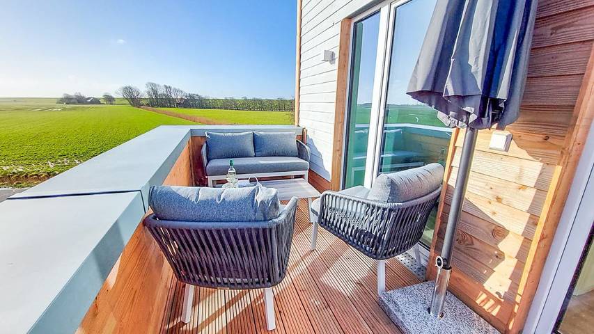 Ferienhaus für 4 Personen, mit Sauna und Ausblick sowie Garten in Butjadingen