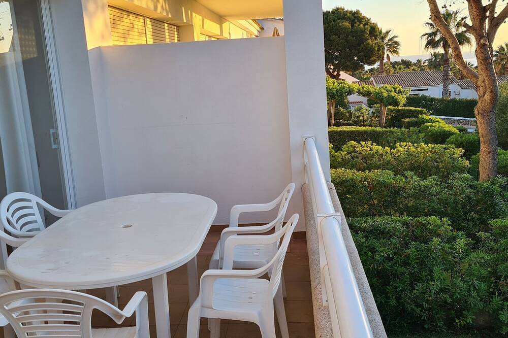 Apartamento entero, Apartment \"Orchidée\"- sea view, swimming pool, air conditioning, terrace. in Arenal d'en Castell, Es Mercadal