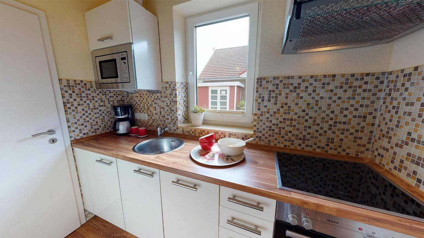 Strandnahes Ferienhaus für 4 Personen mit Kamin und Sauna in Pelzerhaken an der Ostsee in Südstrand Pelzerhaken, Ostholstein