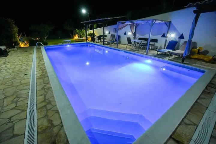 Appartement de vacances pour 6 personnes, avec Terrasse et Jardin ainsi que Piscine et Vue